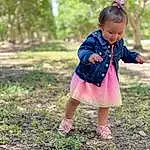 Plant, Eyes, Dress, People In Nature, Tree, Baby & Toddler Clothing, Happy, Toddler, Grassland, Grass, Baby, Pattern, Recreation, Walking, Magenta, Forest, Soil, Landscape, Fun, Person