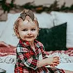 Face, Head, Smile, Hairstyle, Photograph, White, Tartan, Sleeve, Happy, Plaid, Toddler, Tree, Toy, Baby, Beauty, Child, Leisure, Room, Pattern, Event, Person, Joy
