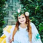 Flower, Smile, Hairstyle, Plant, Shoulder, People In Nature, Petal, Flash Photography, Dress, Branch, Happy, Headgear, Grass, Headpiece, Aqua, Summer, Gown, Wedding Ceremony Supply, Bridal Clothing, Jewellery, Person, Joy, Headwear