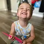Face, Cheek, Skin, Head, Smile, Hairstyle, Eyes, Facial Expression, Standing, Baby & Toddler Clothing, Iris, Happy, Dress, Finger, Fun, Toddler, Baby, Leisure, Thumb, Person, Joy