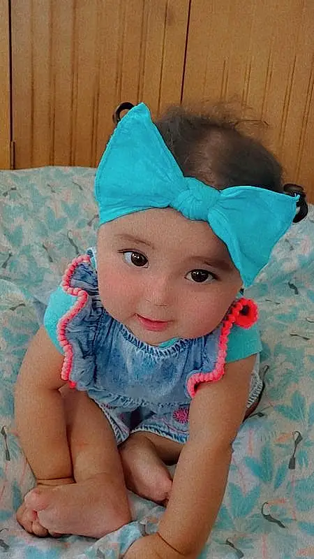 Cap, Azure, Baby & Toddler Clothing, Sleeve, Textile, Costume Hat, Pink, Aqua, Electric Blue, Headband, Pattern, Toddler, Doll, Fictional Character, Headpiece, Baby Products, Fashion Accessory, Beanie, Child, Linens, Person, Headwear