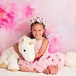 Clothing, Skin, Smile, Photograph, White, Dress, Toy, Textile, Happy, Flash Photography, Pink, Teddy Bear, Comfort, Magenta, Beauty, Sweetness, Child, Petal, Event, Person, Joy