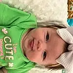 Nose, Face, Cheek, Skin, Lip, Eyes, Facial Expression, White, Green, Textile, Sleeve, Comfort, Baby & Toddler Clothing, Happy, Iris, Smile, Finger, Toddler, Person, Headwear