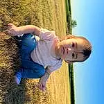 Smile, Hand, Plant, Sky, People In Nature, Azure, Flash Photography, Tree, Happy, Sunlight, Grass, Leisure, Toddler, Wood, Fun, Grassland, Elbow, Electric Blue, Child, T-shirt, Person