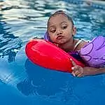 Water, Azure, Outdoor Recreation, Swimming Pool, Happy, Leisure, Aqua, Recreation, Personal Protective Equipment, Tubing, Flash Photography, Electric Blue, Fun, Inflatable, Toddler, Games, Play, Child, Vacation, Wave, Person