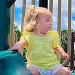 Blue, Cloud, Green, Sky, Happy, Yellow, Leisure, Fun, Toddler, Playground, Baby & Toddler Clothing, City, Grass, Playground Slide, Child, Recreation, Outdoor Play Equipment, Chute, Sitting, Play, Person