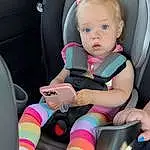 Skin, Vroom Vroom, Car, Automotive Design, Seat Belt, Dress, Comfort, Pink, Car Seat Cover, Car Seat, Baby & Toddler Clothing, Vehicle Door, Toddler, Baby, Steering Wheel, Baby In Car Seat, Plant, Automotive Exterior, Auto Part, Person, Surprise