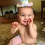 Face, Cheek, Skin, Party Hat, Head, Smile, Mouth, Human Body, Pink, Cap, Happy, Finger, Fun, Costume Hat, Chest, Toddler, Bathing, Thigh, Cone, Baby, Person, Joy