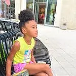 Hairstyle, Black, Fashion, Standing, Happy, Thigh, Leisure, Sidewalk, Cool, People, Public Space, Summer, Travel, Toddler, Road, Sandal, Human Leg, City, Human Settlement, Child, Person