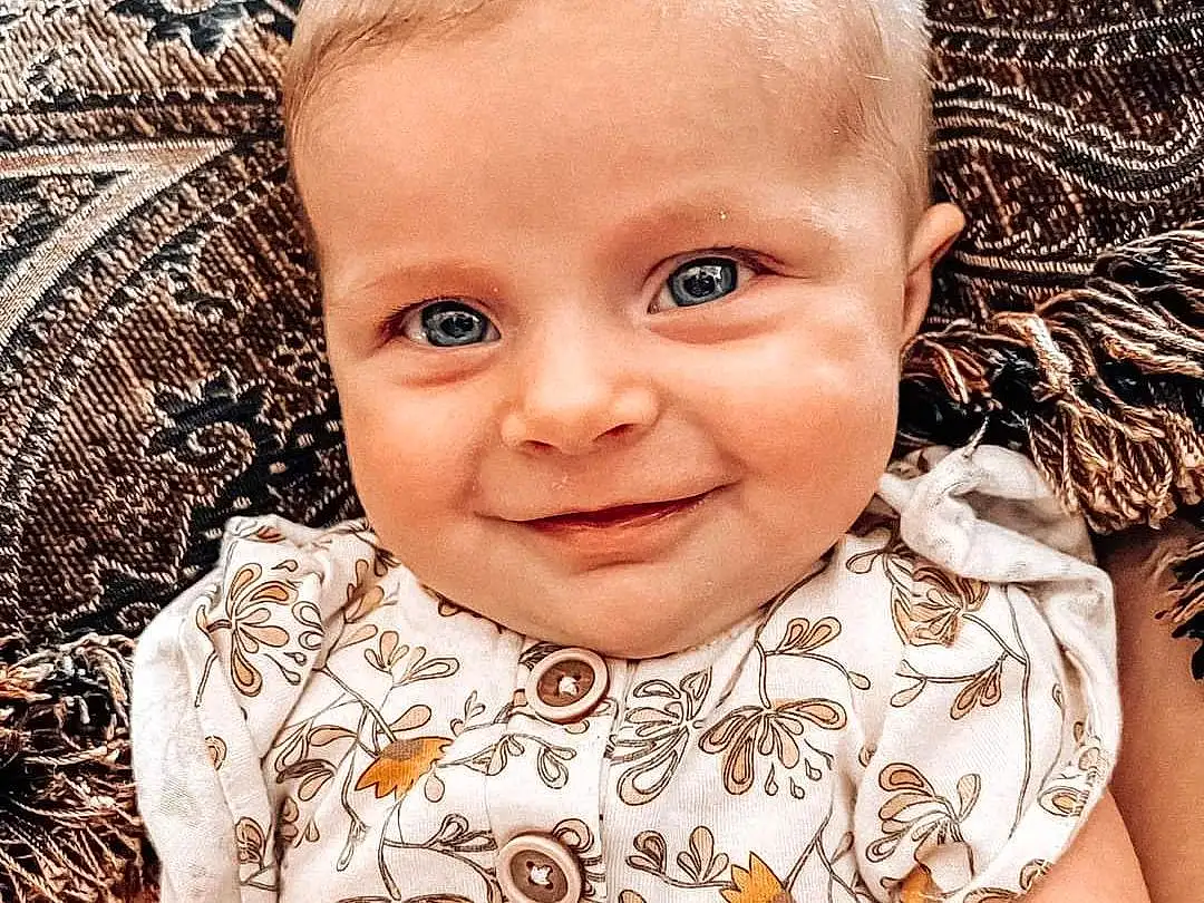 Nose, Face, Cheek, Skin, Smile, Lip, Chin, Eyebrow, Eyes, Facial Expression, Flash Photography, Happy, Iris, Sleeve, Baby & Toddler Clothing, Grass, Toddler, Child, Adaptation, Person, Joy