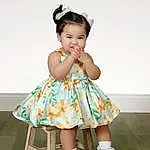Clothing, Hair, Arm, One-piece Garment, Dress, Baby & Toddler Clothing, Human Body, Flash Photography, Sleeve, Day Dress, Happy, Toddler, Pattern, Fashion Design, Ruffle, Fun, Headpiece, Formal Wear, Child, Sock, Person