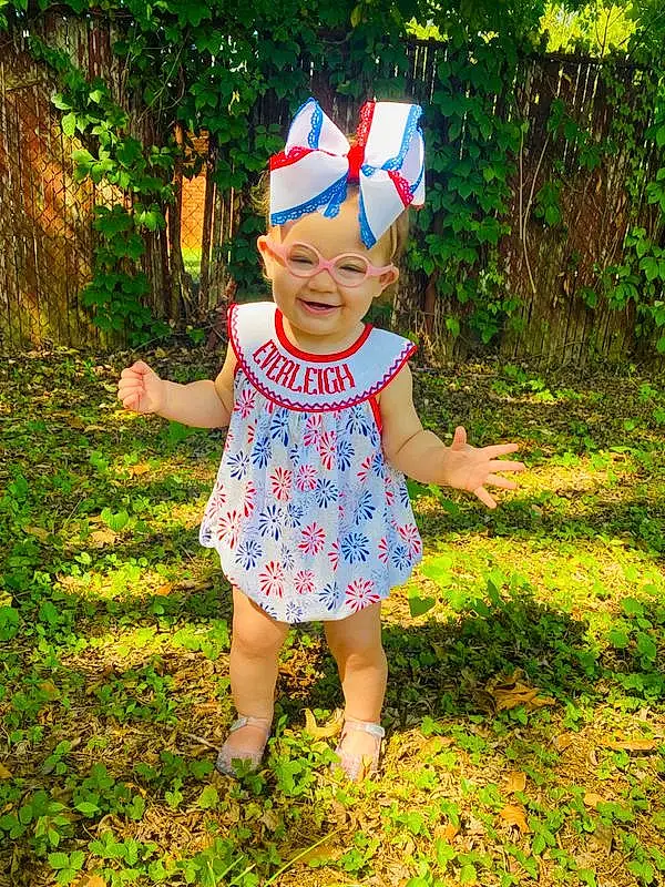 People In Nature, Baby & Toddler Clothing, Plant, Botany, Grass, Headgear, Toddler, Happy, Smile, Groundcover, Meadow, Baby, Fun, Lawn, Electric Blue, Child, Garden, Spring, Pattern, Party Supply, Person, Headwear