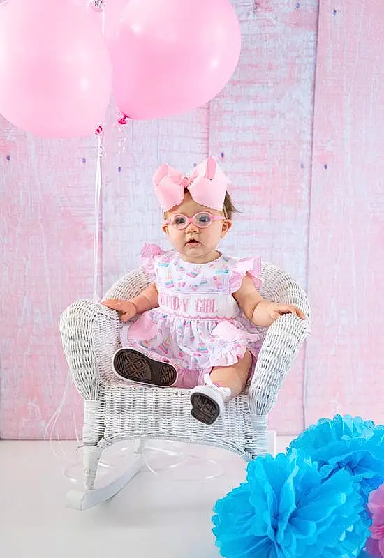 Photograph, White, Blue, Textile, Balloon, Pink, Happy, Baby & Toddler Clothing, Chair, Magenta, Party Supply, Beauty, Event, Pattern, Fun, Electric Blue, Fashion Accessory, Toy, Child, Room, Person, Headwear