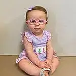 Face, Hair, Glasses, Lip, Dress, Baby & Toddler Clothing, Eyewear, Sleeve, Baby, Vision Care, Pink, Sunglasses, Day Dress, One-piece Garment, Goggles, Smile, Happy, Toddler, Magenta, Pattern, Person