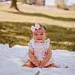 Smile, Photograph, Plant, Flash Photography, People In Nature, Happy, Dress, Sunlight, Grass, Tree, Baby & Toddler Clothing, Baby, Toddler, Sky, Fun, Headpiece, Hat, Event, Peach, Sitting, Person, Joy, Headwear