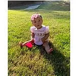 People In Nature, Leaf, Sleeve, Happy, Baby & Toddler Clothing, Shorts, Grass, Cap, Plant, T-shirt, Hat, Grassland, Toddler, Adaptation, Meadow, Lawn, Landscape, Beauty, Person, Surprise, Headwear