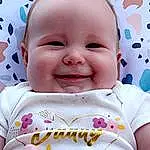 Face, Nose, Smile, Cheek, Skin, Head, Lip, Chin, Eyes, Mouth, Facial Expression, White, Dress, Baby & Toddler Clothing, Baby, Happy, Sleeve, Pink, Toddler, Child, Person, Joy