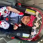 Comfort, Baby Carriage, Lap, Baby, Vroom Vroom, Toddler, Sleeve, Auto Part, Baby Products, Car Seat, Vehicle, Child, Carmine, Baby & Toddler Clothing, Bag, Elbow, Toy, Automotive Design, Sitting, Automotive Exterior, Person, Joy, Headwear