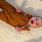 Skin, Arm, Smile, Comfort, Human Body, Sleeve, Gesture, Finger, Fawn, Baby, Toddler, Wood, Linens, Fun, Baby & Toddler Clothing, Child, Happy, Wrist, Pattern, Person