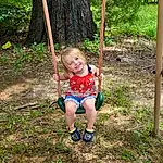 Plant, Leaf, Tree, Shorts, Grass, Swing, Toddler, Smile, Leisure, Playground, Recreation, Fun, People In Nature, Baby, Soil, Baby & Toddler Clothing, Outdoor Play Equipment, Happy, Child, Jungle, Person, Joy