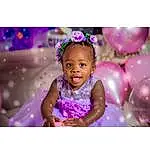 Face, Hair, Head, Smile, Eyes, Purple, Sleeve, Happy, Dress, Violet, Pink, Baby & Toddler Clothing, Baby, Toddler, Petal, Magenta, Fun, Flash Photography, Party Supply, Headpiece, Person