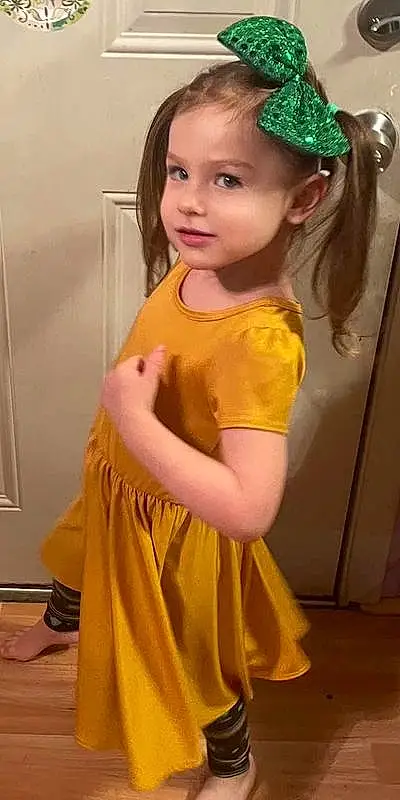 Sleeve, Dress, Yellow, Toddler, Long Hair, Happy, Fun, Blond, Jewellery, Headband, Headpiece, Baby & Toddler Clothing, Event, Child, Peach, Fashion Accessory, Costume, Hair Accessory, Human Leg, Person