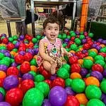 Ball Pit, Fun, Public Space, Child, Human Settlement, Ball, Event, Leisure, Toy, Sweetness, Confectionery, Play, City, Plastic, Marketplace, Toddler, Market, Person
