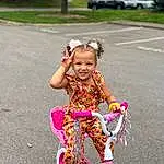 Bicycle, Smile, Wheel, Tire, Dress, Bicycle Wheel, Bicycles--equipment And Supplies, Vehicle, Plant, Happy, Pink, Bicycle Accessory, Bicycle Tire, Vroom Vroom, Toddler, Magenta, Asphalt, Riding Toy, Recreation, Tree, Person, Joy