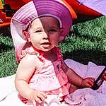 Pink, Dress, Happy, Sun Hat, Grass, Baby & Toddler Clothing, Hat, Headgear, Baby, Toddler, Red, Fun, Magenta, Leisure, Event, Child, People In Nature, Fashion Accessory, Recreation, Costume Hat, Person, Headwear
