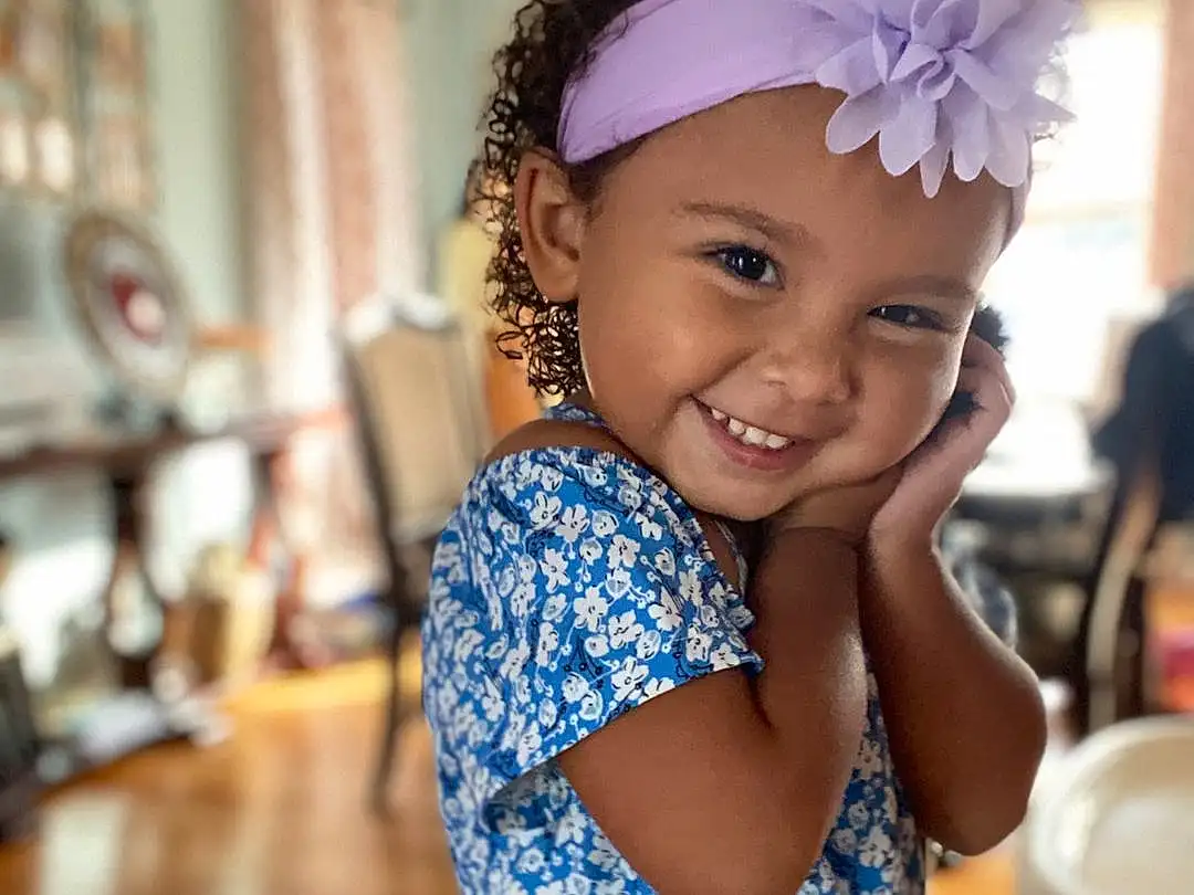 Smile, Skin, Hairstyle, Facial Expression, Purple, Happy, Flash Photography, Fun, Toddler, Headpiece, Electric Blue, Child, Event, Baby & Toddler Clothing, Headband, Magenta, Fashion Design, Leisure, Fashion Accessory, Person, Joy, Headwear