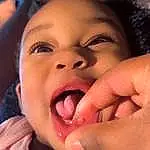 Nose, Cheek, Skin, Lip, Chin, Smile, Eyebrow, Tongue, Eyes, Tooth, Mouth, Human Body, Jaw, Happy, Gesture, Finger, Baby, Toddler, Thumb, Person