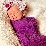 Face, Skin, Comfort, Purple, Textile, Sleeve, Pink, Violet, Baby Sleeping, Baby, Magenta, Toddler, Linens, Cap, Wool, Knit Cap, Baby & Toddler Clothing, Fashion Accessory, Furry friends, Child, Person