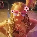 Glasses, Skin, Lip, Vision Care, Goggles, Mouth, Sunglasses, Smile, Eyewear, Pink, Happy, Cool, Toddler, Fun, Magenta, Thumb, Personal Protective Equipment, Long Hair, Blond, Child, Person, Joy