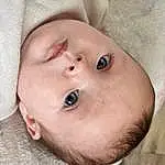 Forehead, Nose, Cheek, Skin, Lip, Chin, Eyebrow, Mouth, Eyes, Eyelash, Neck, Iris, Baby, Ear, Headgear, Toddler, Baby & Toddler Clothing, Happy, Person